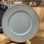 Sousplat cinza e cobre